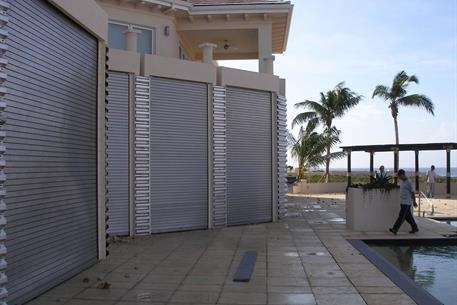 Residential property showing multiple rolling doors closed