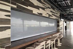 Close up side view of a counter shutter utilized in a restaurant
