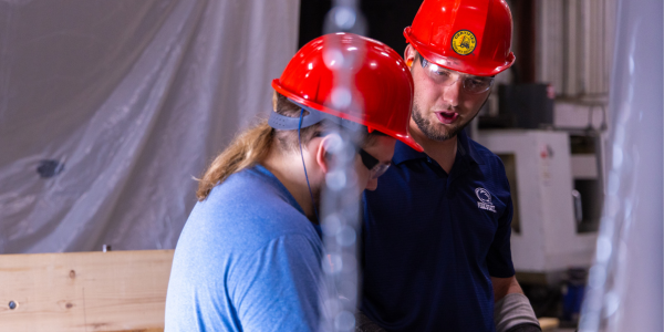 George Gendler working in Cornell Cookson manufacturing facility