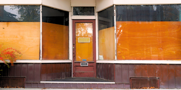 retail store with windows boarded