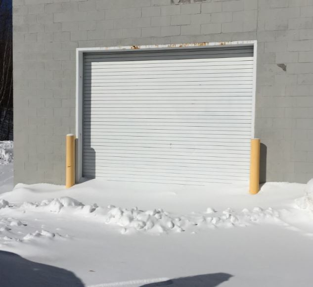 energy efficient garage doors with lots of snow